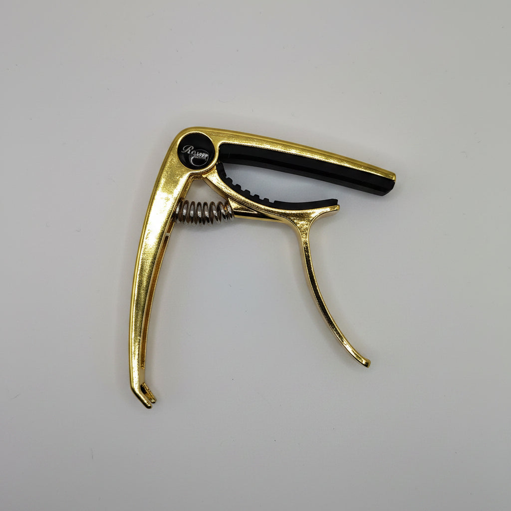 CAPO PARA GUITARRA COLOR ORO
